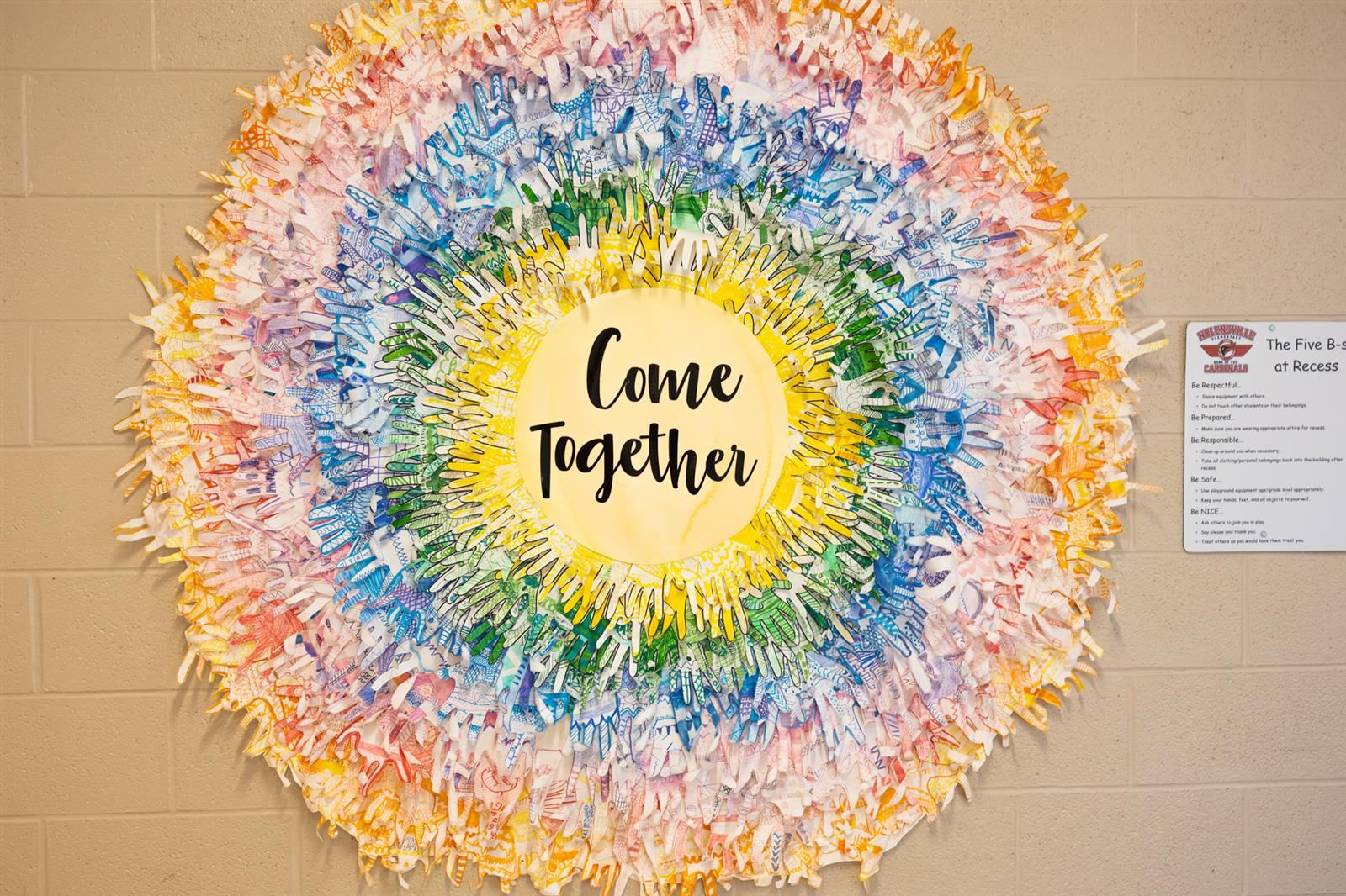 Paper hands that says Come Together